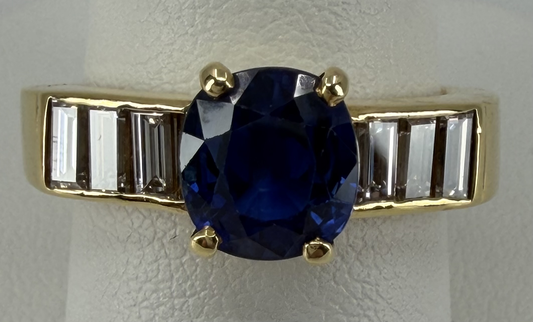 18 Karat Yellow Gold Oval Sapphire & Baguette Diamond Ring