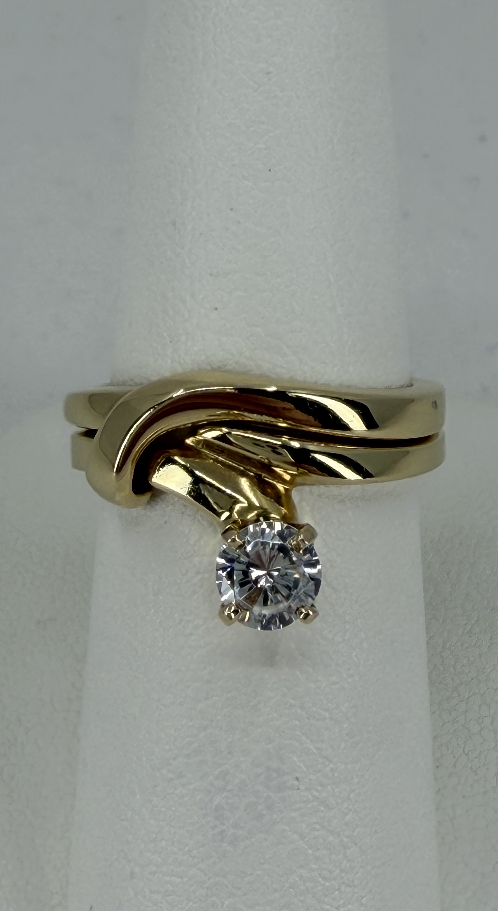 14 Karat Yellow Gold Interlocking Engagement Ring With Cubic Zirconia And Matching Wedding Band