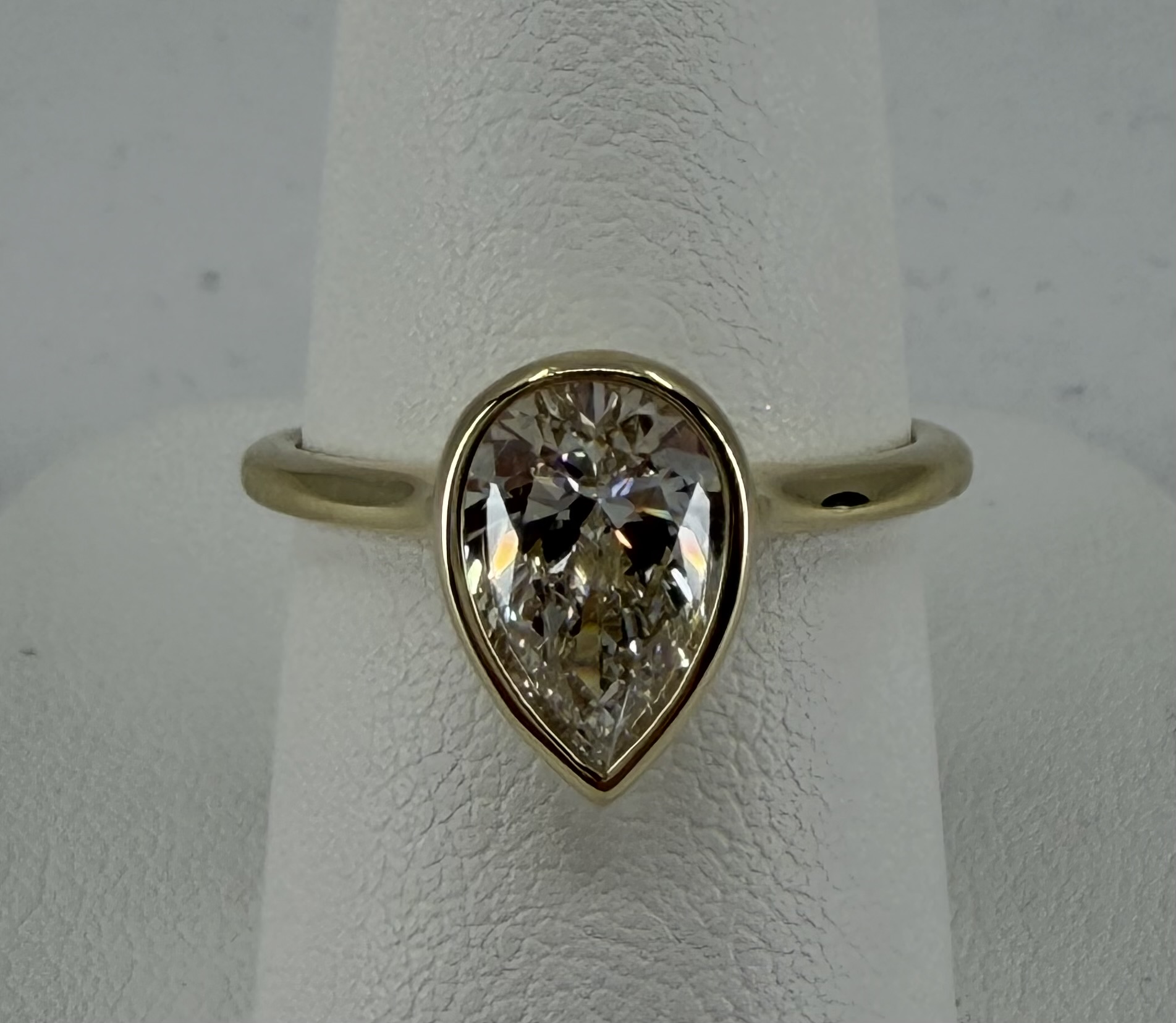 14 Karat Yellow Gold Bezel Solitaire Ring with Pear Diamond = 1.51 Carats, G Color,  SI1 Clarity, GIA Certified