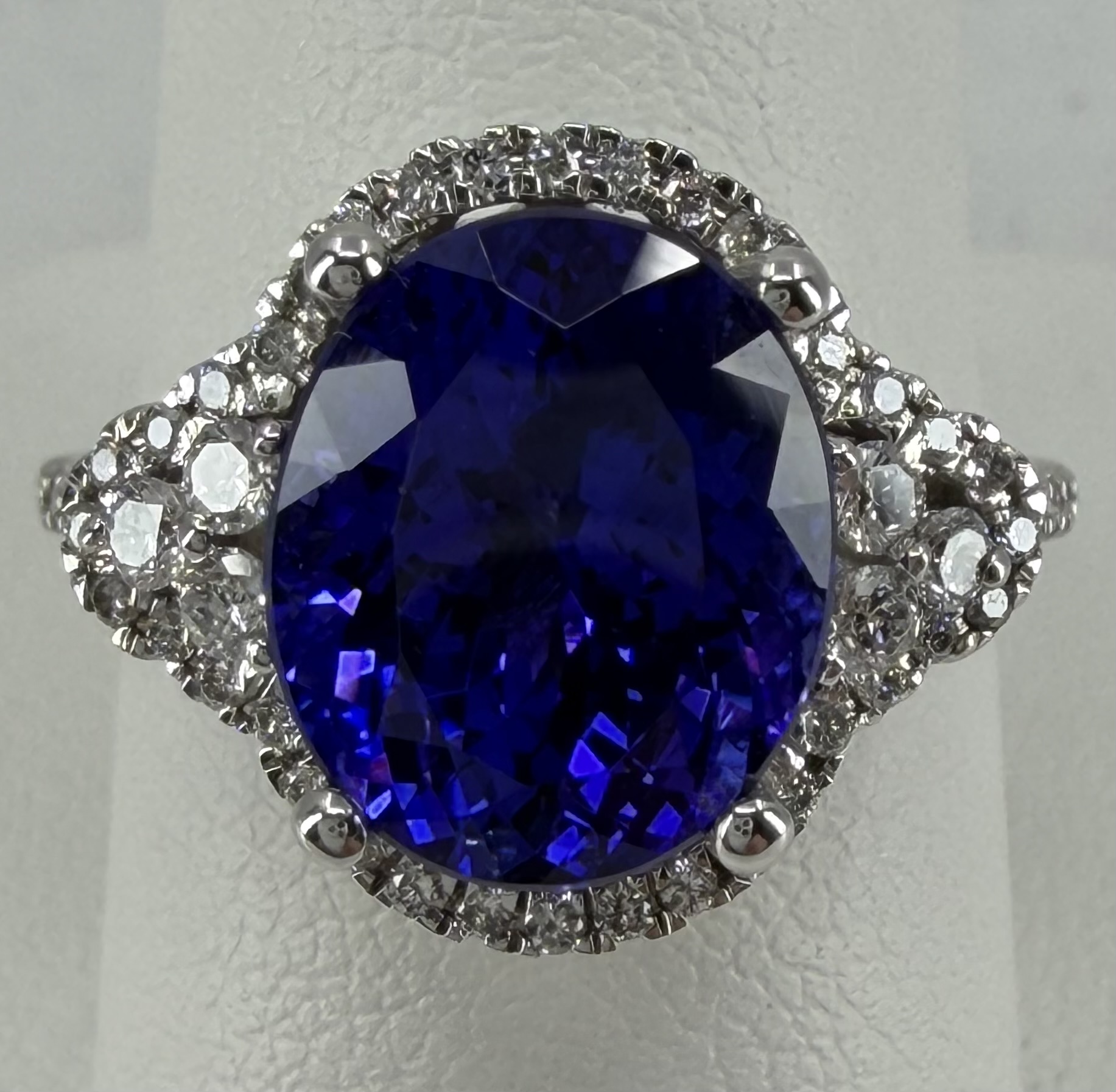 14 Karat White Gold Oval AAA Tanzanite & Diamond Ring