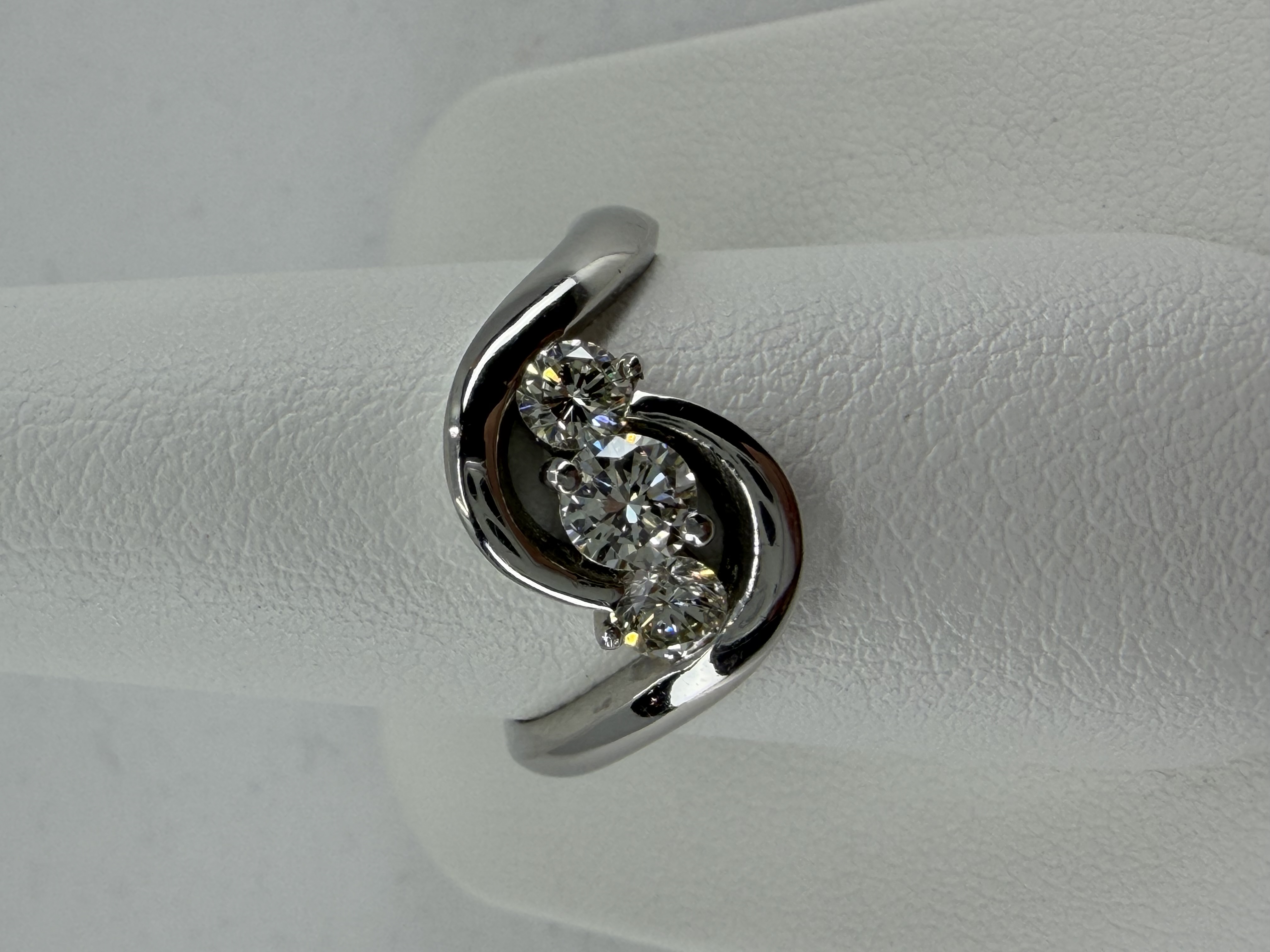 Platinum Three-Stone Diamond Swirl Ring