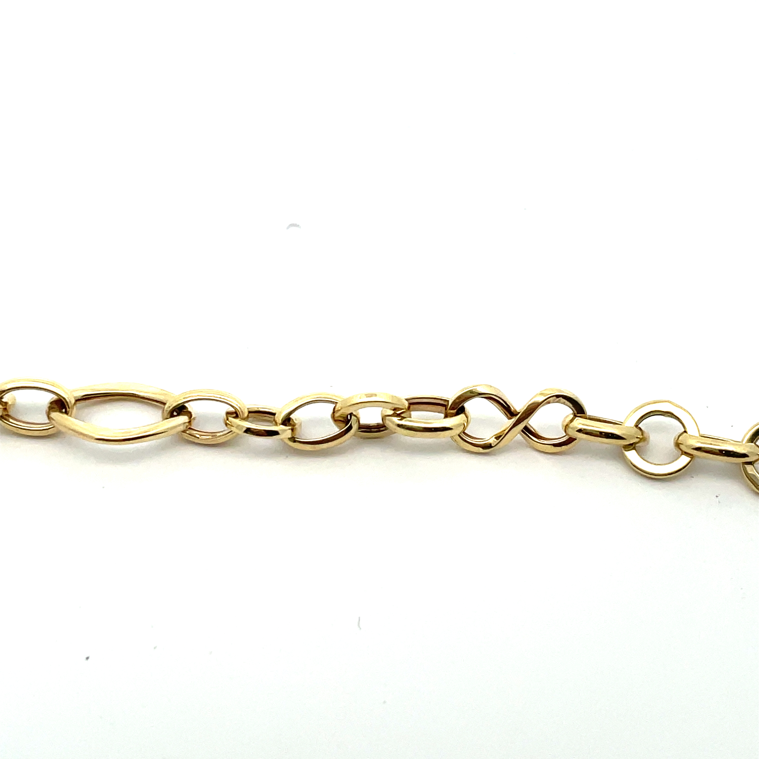 8 ROUNDOVALINFINITY LINK BRACELET 10KY