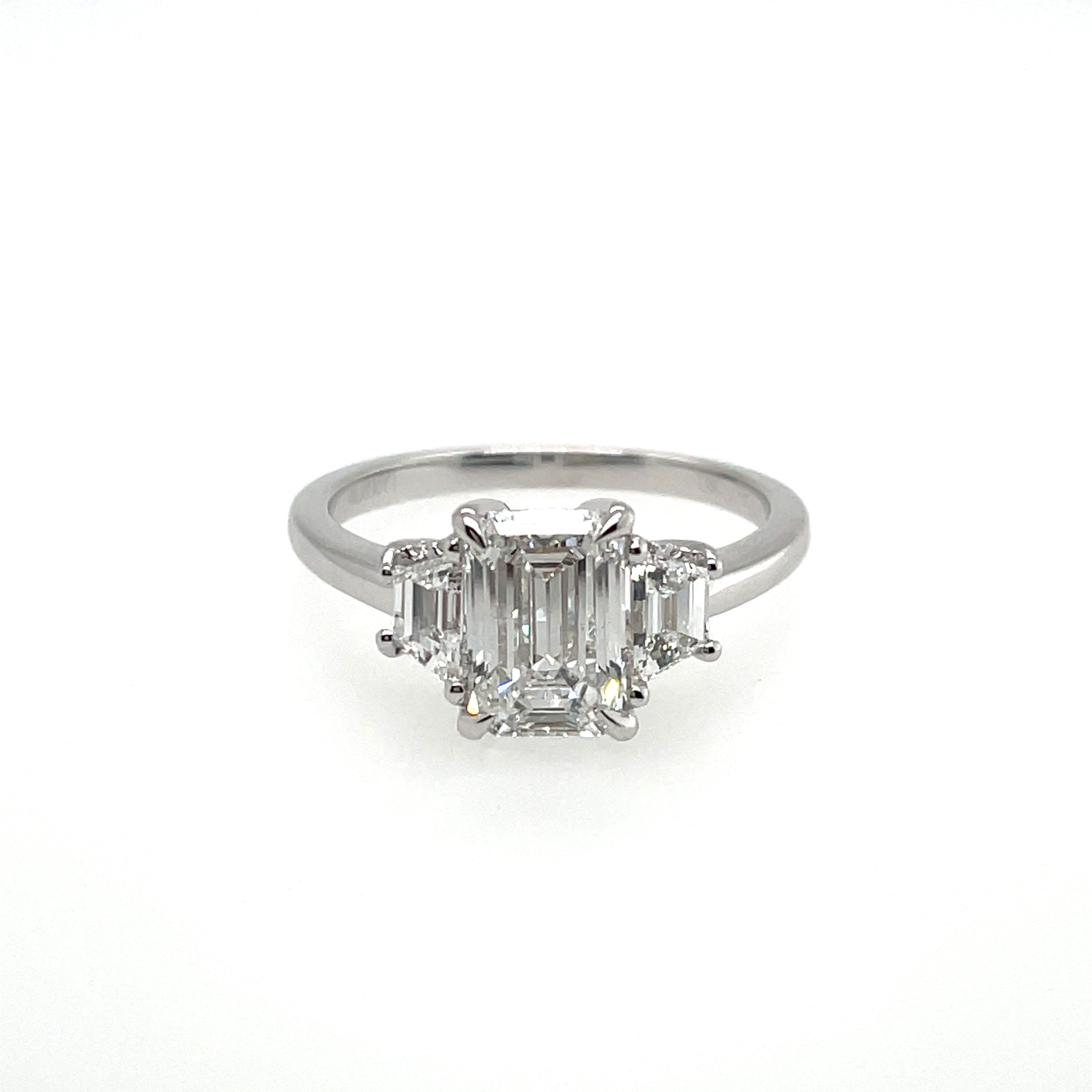 SUPER MAN MADE CREATED 2.31CTW DIAMOND "3-STONE" HIDDEN-HALO ENGAGEMENT RING CONTAINING 1.58CT EMERALD CUT DIAMOND CENTER E VS2 IGI LG526259376  2 TRAPEZOID DIAMONDS .66CTW  14 ROUND HIDDEN HALO DIAMONDS .07CTW E-F VS 14KW10277