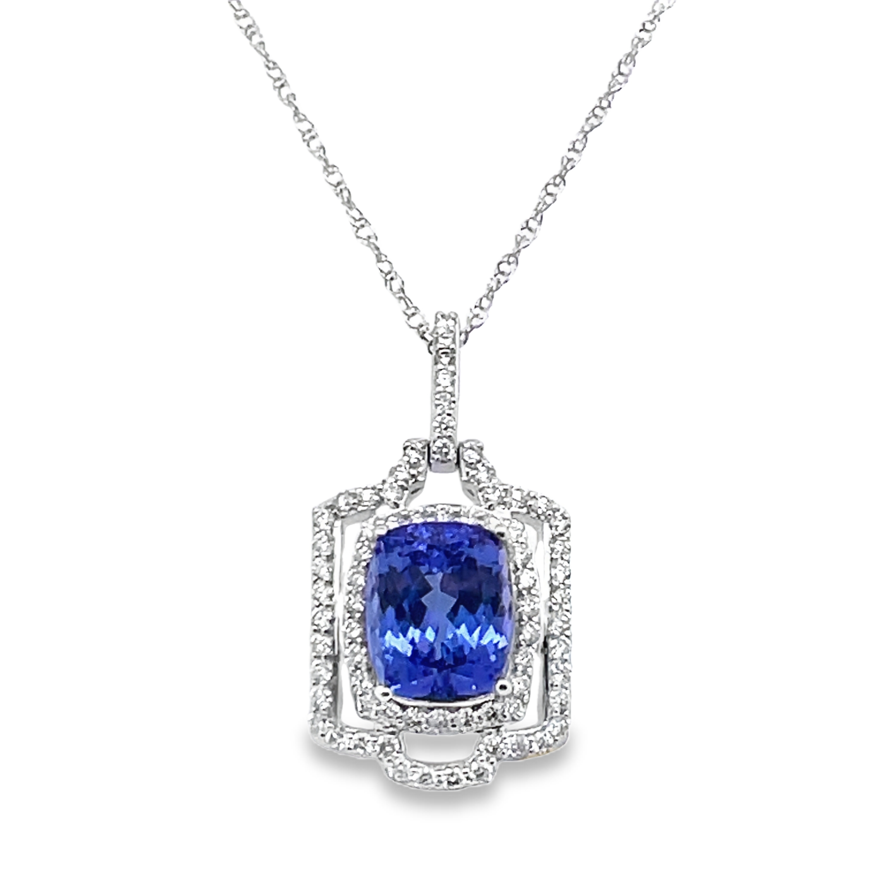 4.98TGW TANZANITE + DIAMOND DOUBLE-HALO PENDANT/CHAIN CONTAINING: 4.25CT EMERALD CUT TANZANITE CENTER + 71 ROUND DIAMONDS .73TDW 14KW