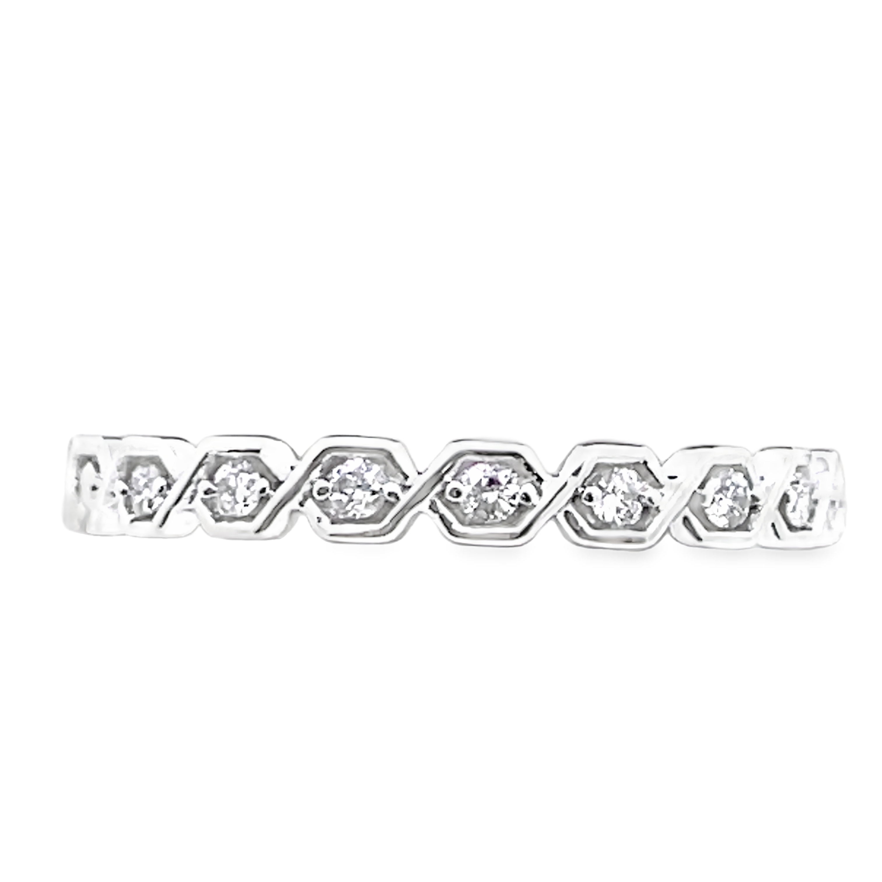 .08CTW LDS DIAMOND ZIG-ZAG BAND CONTAINING: 7 ROUND DIAMONDS 10KW