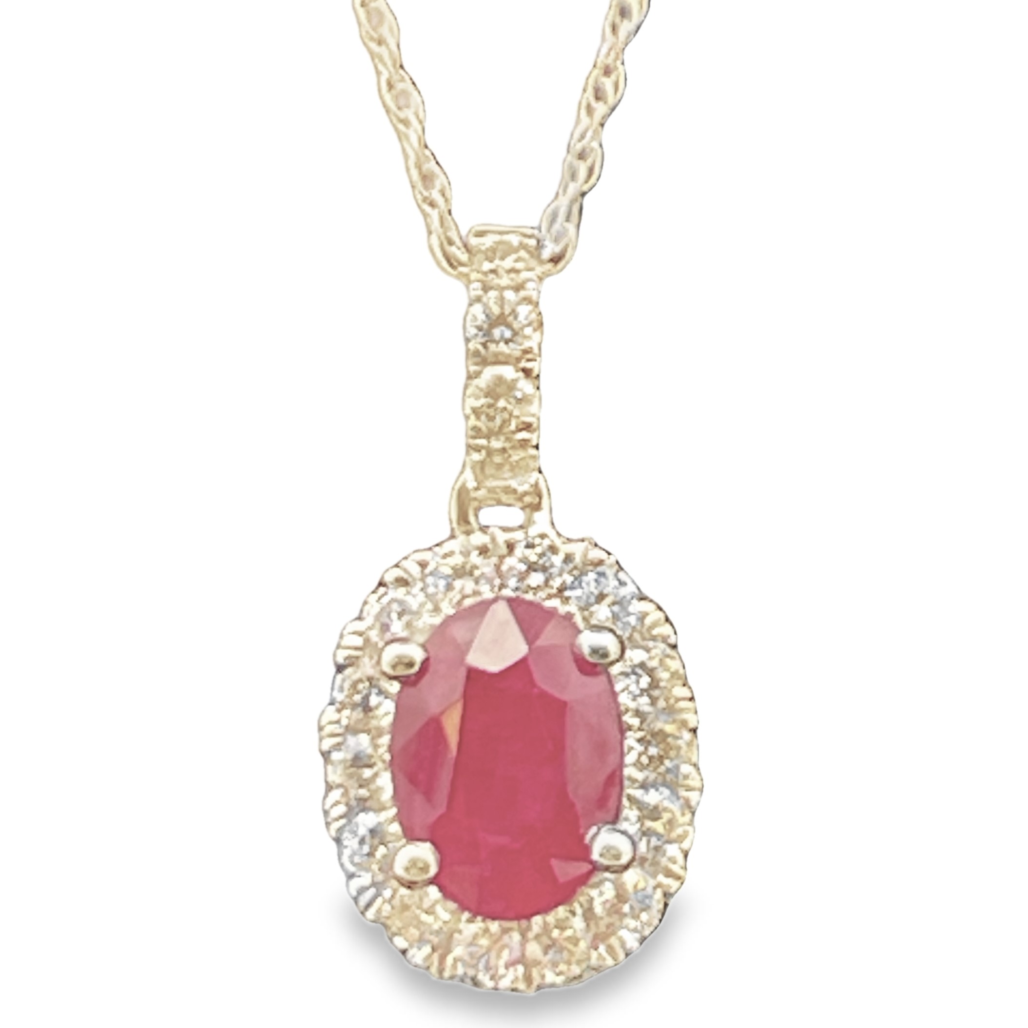 1.09TGW RUBY AND DIAMOND HALO PENDANT/CHAIN CONTAINING: .88CT OVAL RUBY CENTER + 18 ROUND DIAMONDS .21TDW 14KW GEM J CHAIN