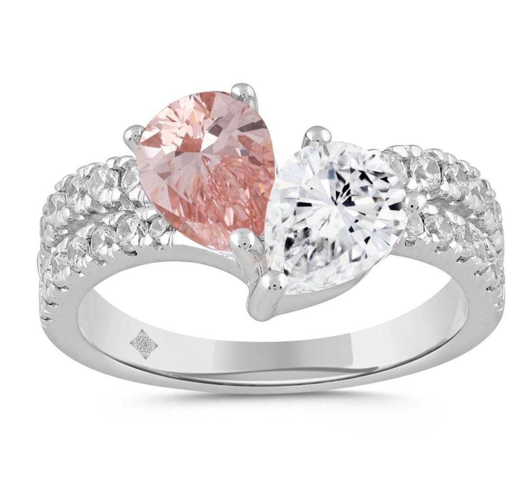 SUPER MAN MADE CREATED 2.00CTW DIAMOND BYPASS RING CONTAINING: .75CT PEAR SHAPE PINK DIAMOND + .75CT PEAR SHAPE WHITE DIAMOND + 25 ROUND WHITE DIAMONDS .50CTW F VS2 + 1 ROUND PINK DIAMOND  14KW