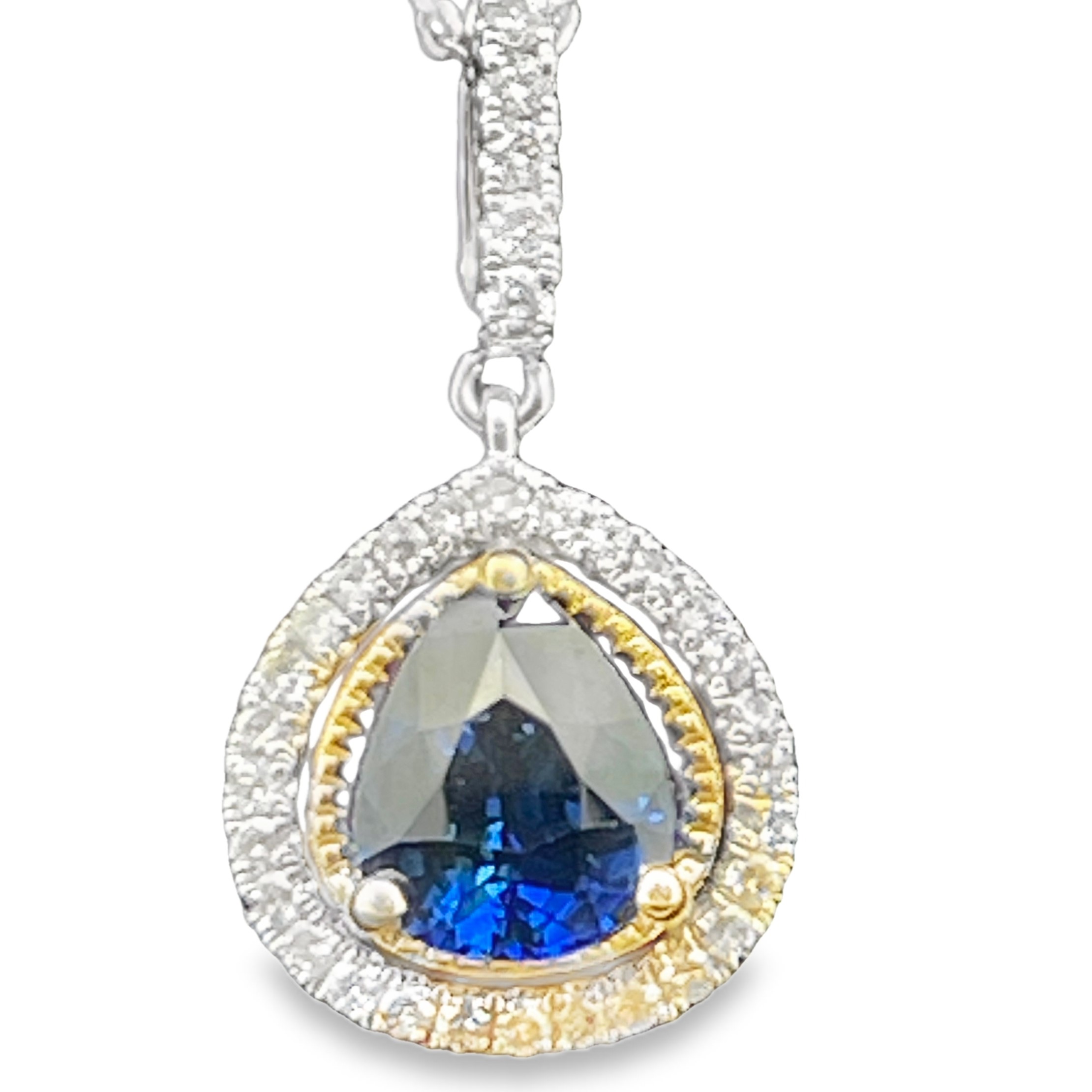 1.67TGW SAPPHIRE + DIAMOND HALO PENDANT/CHAIN CONTAINING: 1.48CT PEAR SHAPE BLUE SAPPHIRE CENTER + 33 ROUND DIAMONDS .19TDW 14KWY CHAIN INCLUDED