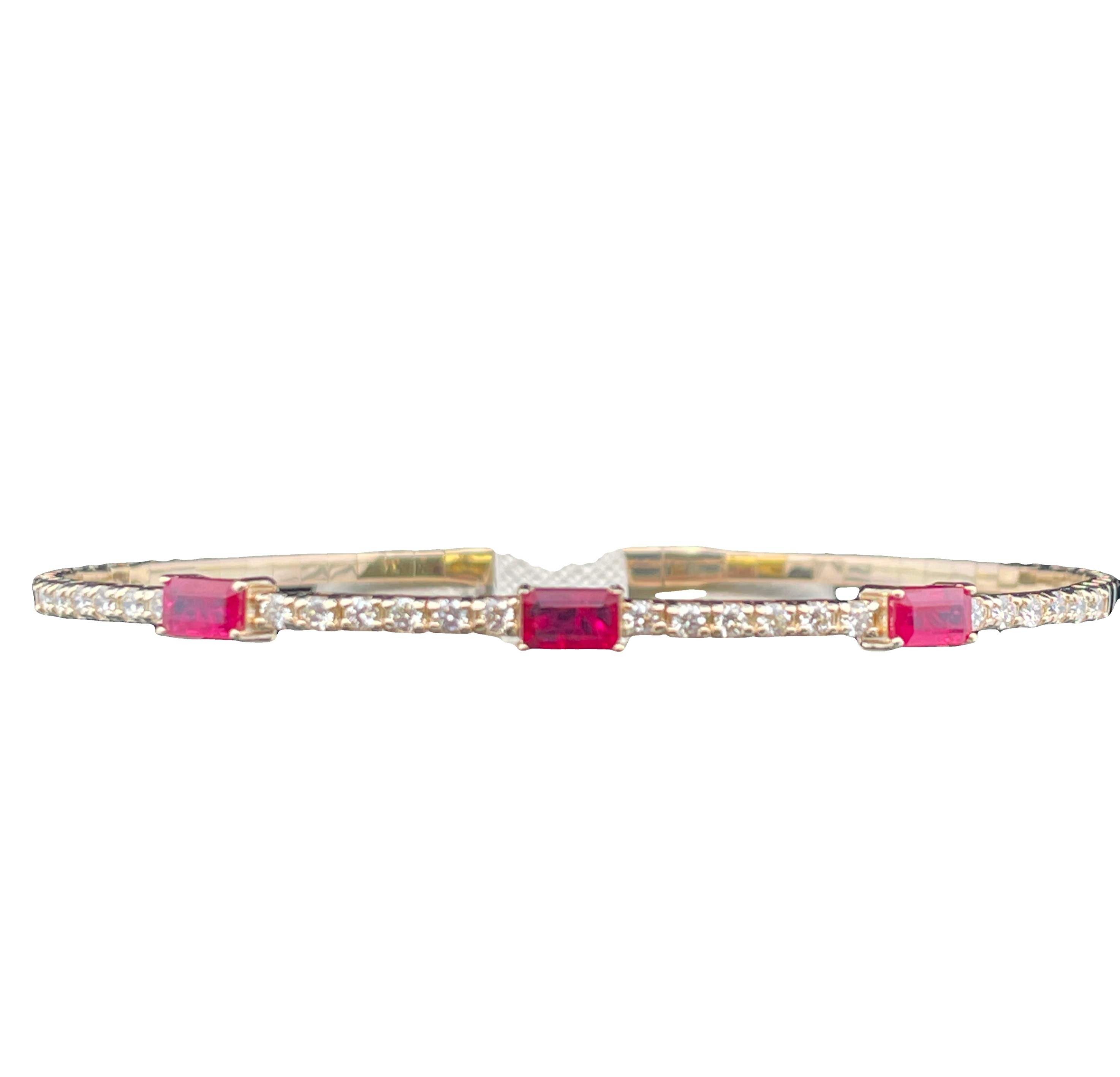 1.51TGW RUBY AND DIAMOND FLEX BANGLE CONTAINING: 3 EMERALD CUT RUBY STATIONS 1.00CTW + 24 ROUND DIAMONDS .51TDW 14KY
