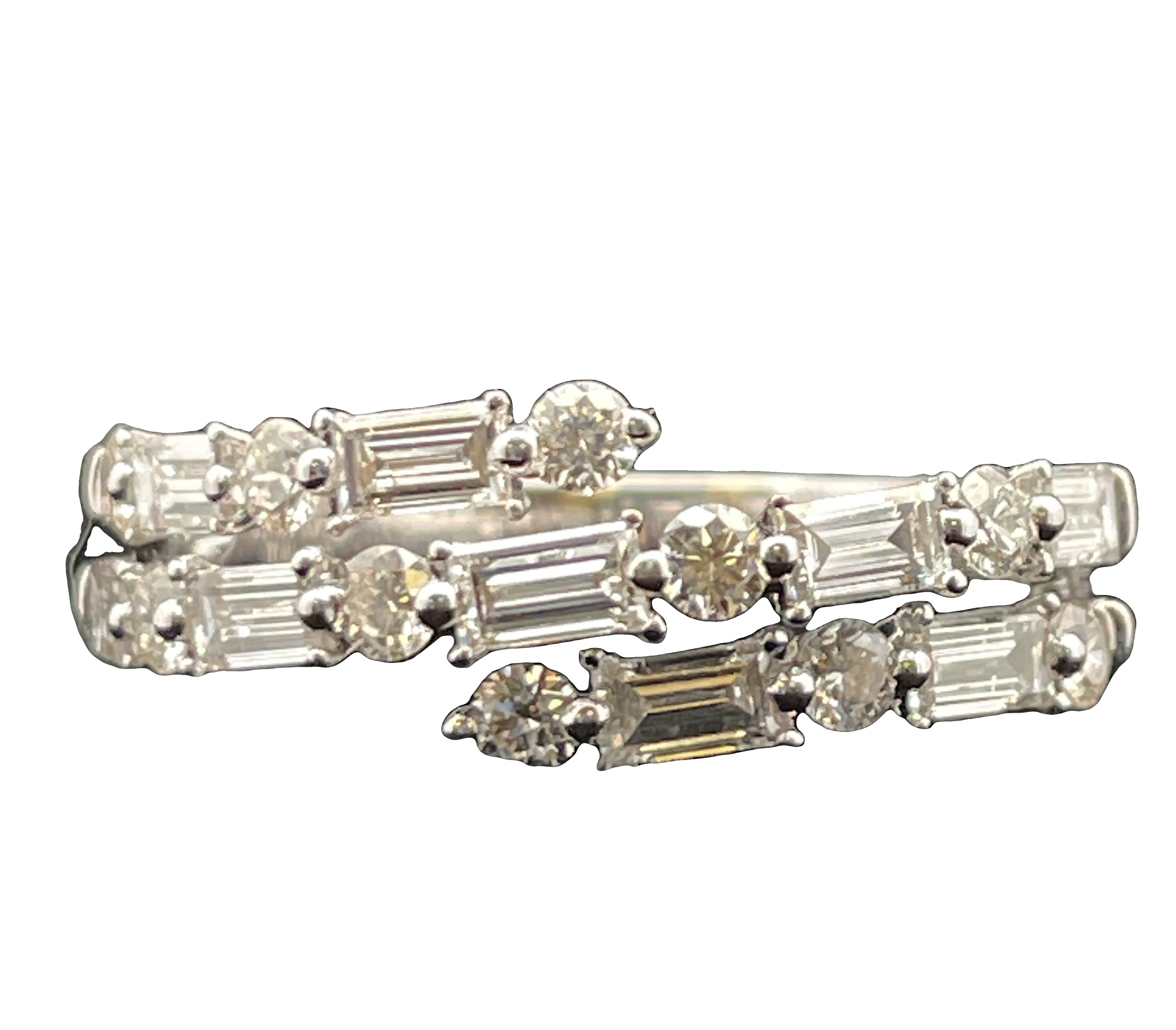 1.39CTW DIAMOND "COIL" RING CONTAINING: 9 BAGUETTE DIAMONDS .938CTW + 10 ROUND DIAMONDS .458CTW 14KW