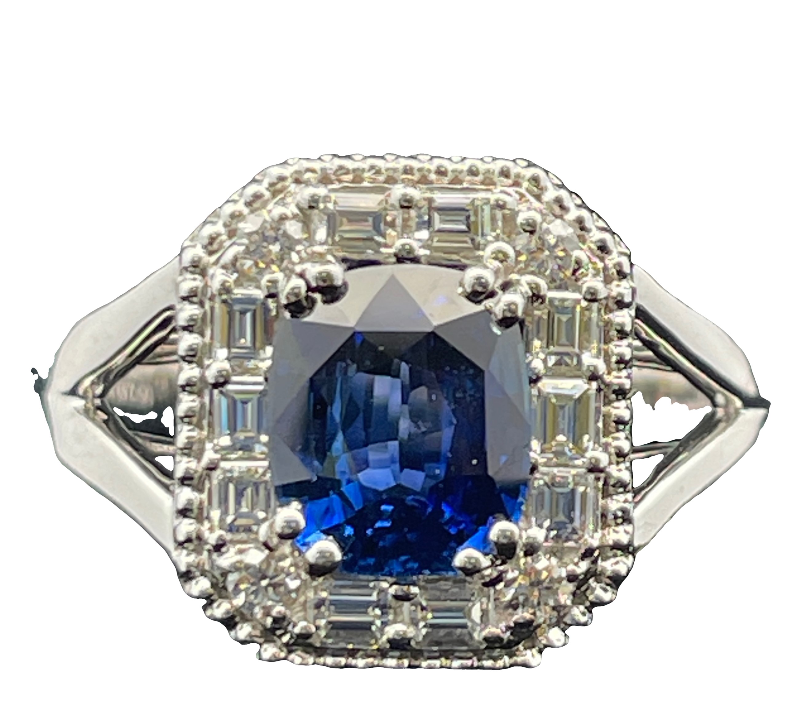 2.24TGW SAPPHIRE AND DIAMOND OCTAGON HALO RING CONTAINING: 1.805CT CUSHION BLUE SAPPHIRE CENTER + 4 ROUND DIAMONDS .092CTW + 10 BAGUETTE DIAMONDS .352CTW 14KW