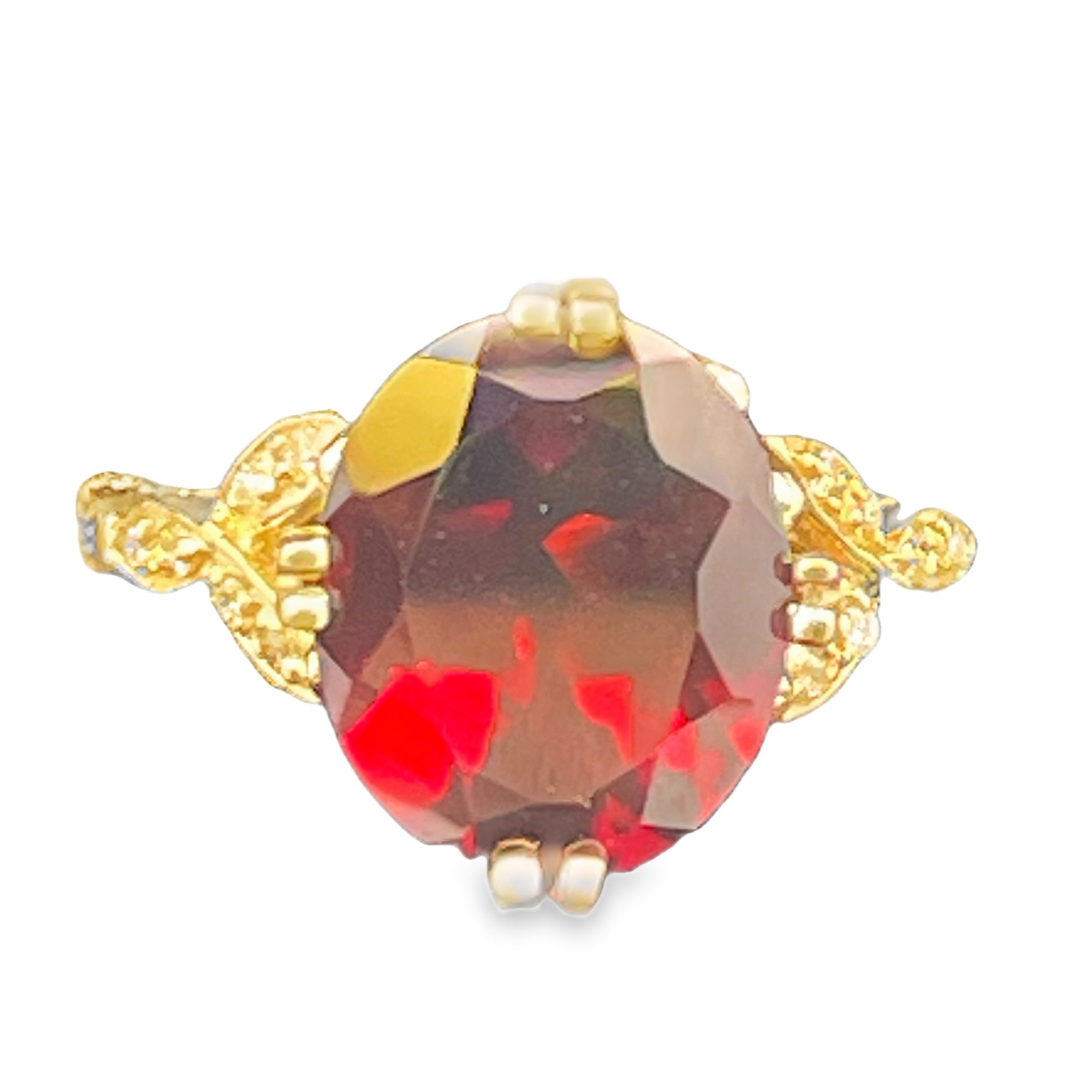 5.57TGW OVAL GARNET + DIAMOND ACCENT RING CONTAINING: 5.50CT OVAL GARNET CENTER + 12 ROUND DIAMONDS .07TDW 14KY