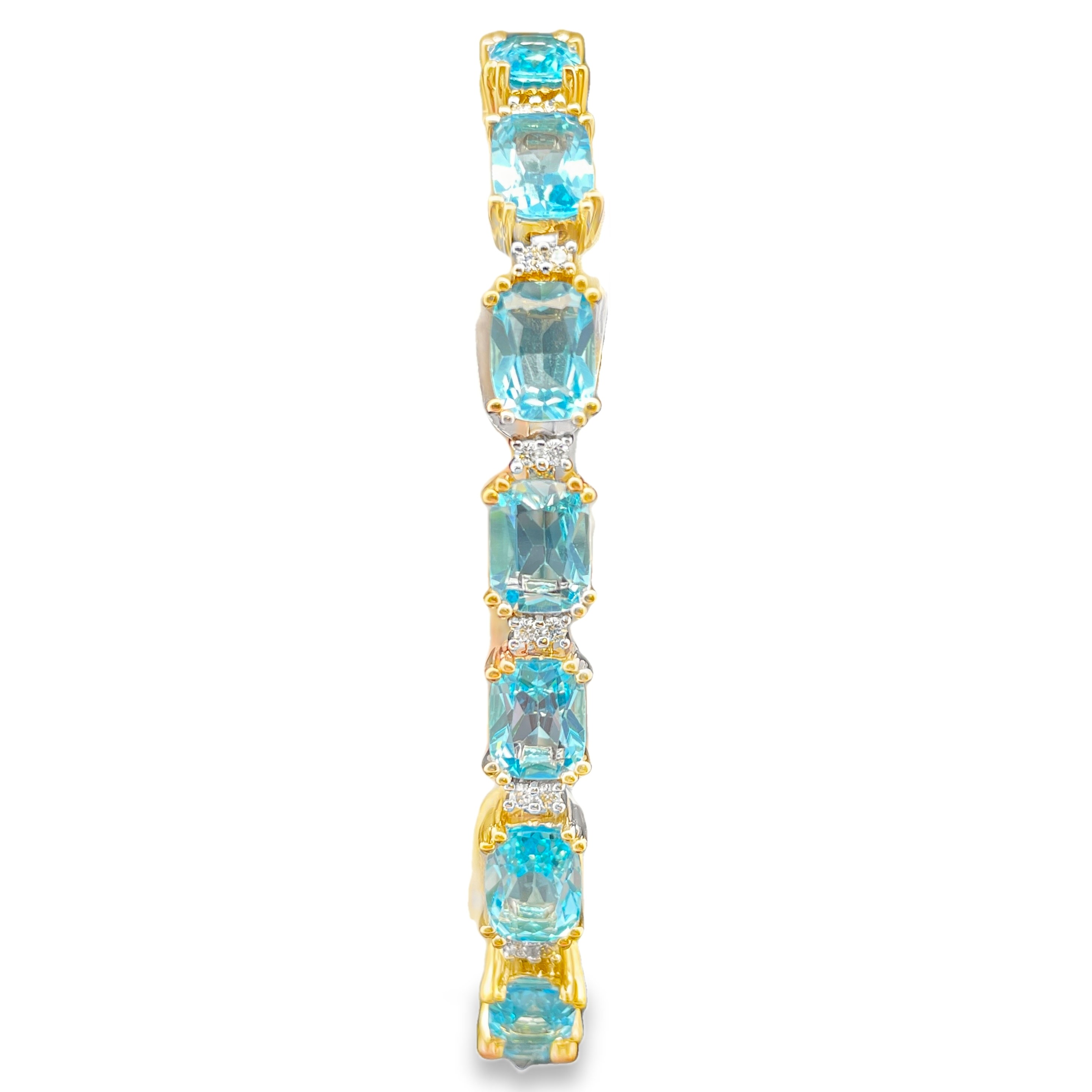 34.51TGW BLUE TOPAZ AND DIAMOND BRACELET CONTAINING:  17 CUSHION BLUE TOPAZ 34CTW + 34 ROUND DIAMONDS .51TDW 14KY