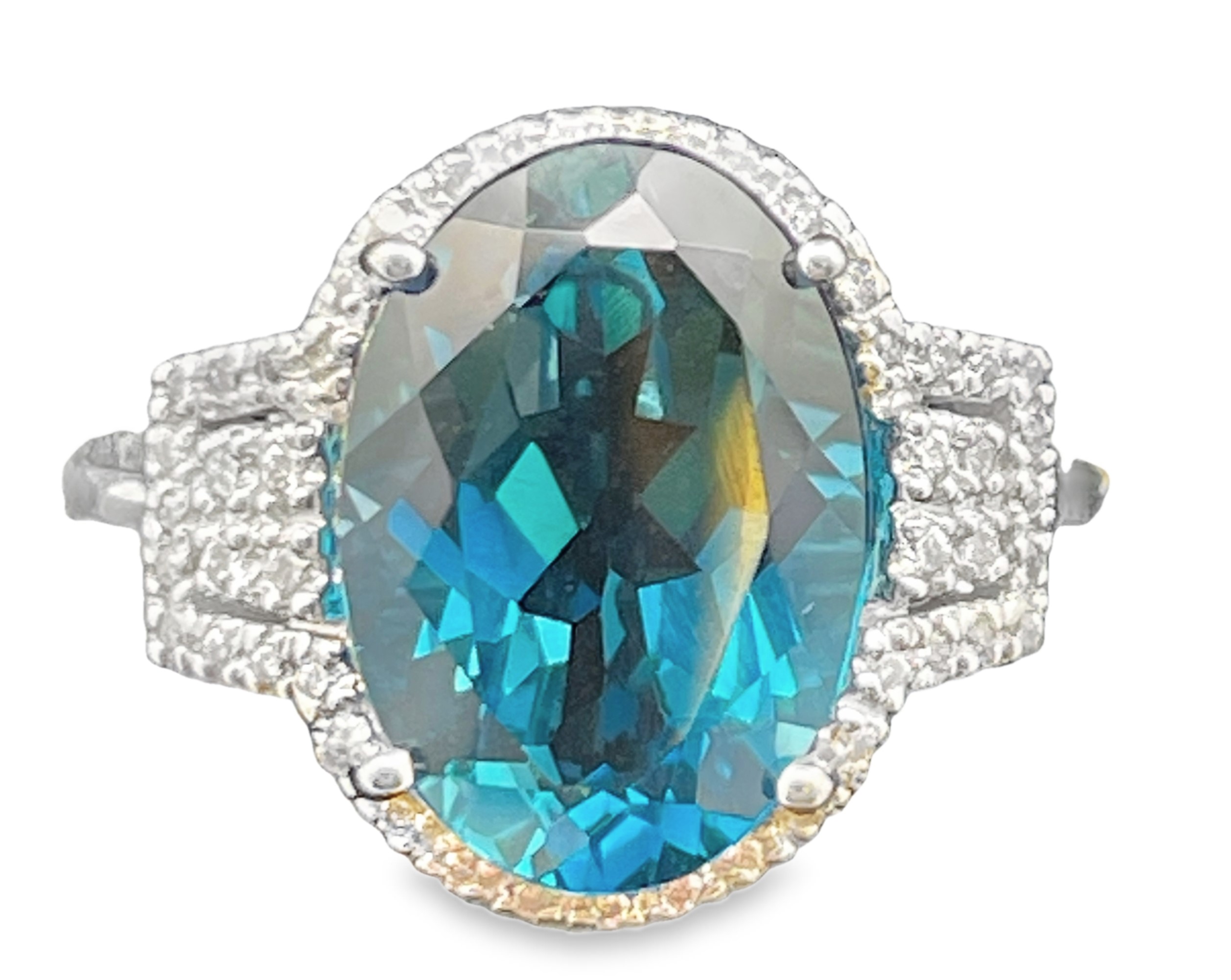 8.66TGW OVAL LONDON BLUE TOPAZ + DIAMOND HALO RING CONTAINING: 8.50CT OVAL LONDON BLUE TOPAZ CENTER + 48 ROUND DIAMONDS .16TDW 14KW