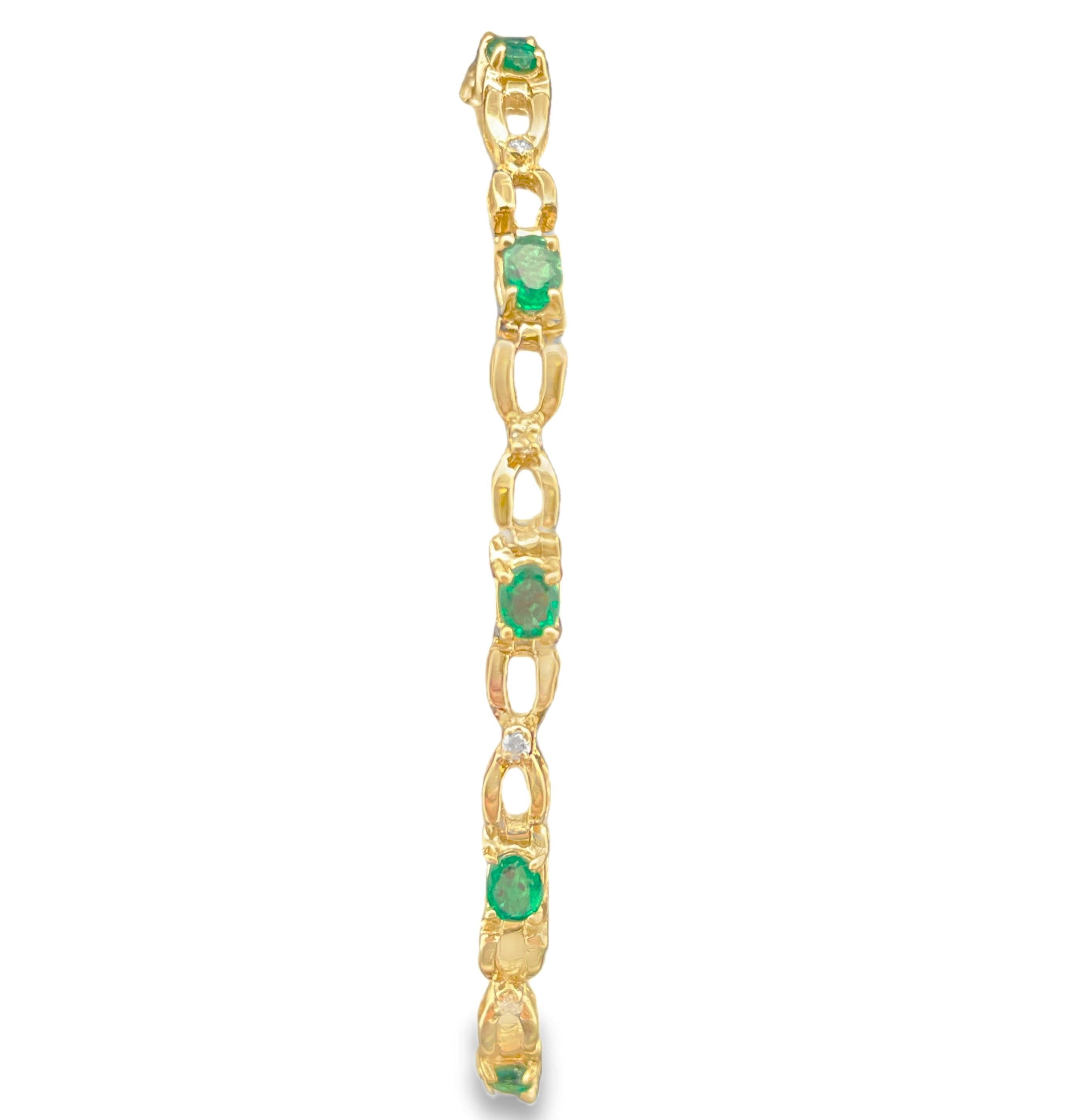 2.31TGW EMERALD + DIAMOND BRACELET CONTAINING: 11 OVAL EMERALDS 2.20CTW ALTERNATING WITH 11 ROUND DIAMONDS .11TDW 14KY