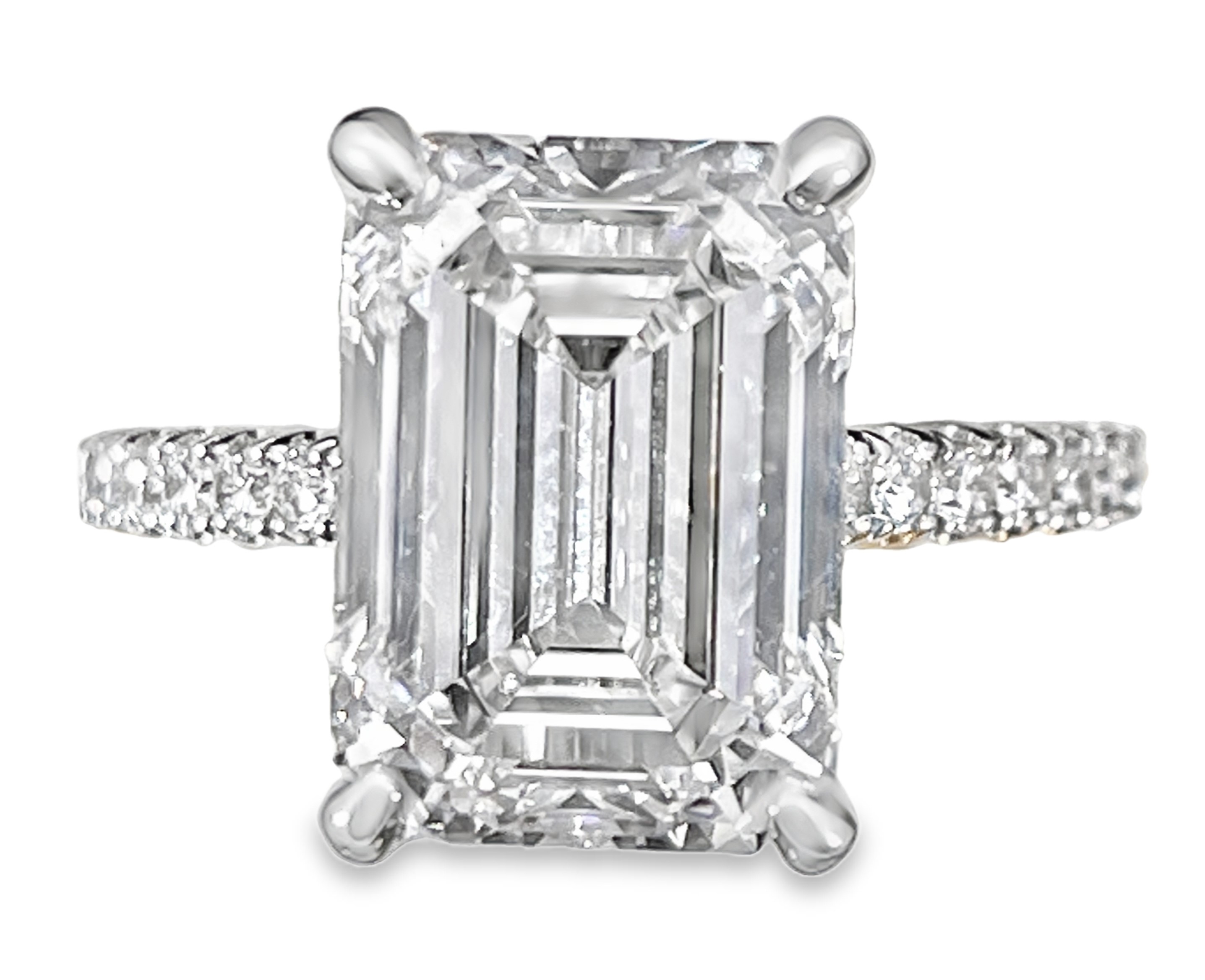 SUPER MAN MADE CREATED 5.46CTW DIAMOND HIDDEN-HALO ENGAGEMENT RING CONTAINING: 5.09CT EMERALD CUT DIAMOND CENTER E VS1 IGI LG546221579 + 40 ROUND MELEE DIAMONDS .46CTW 14KW