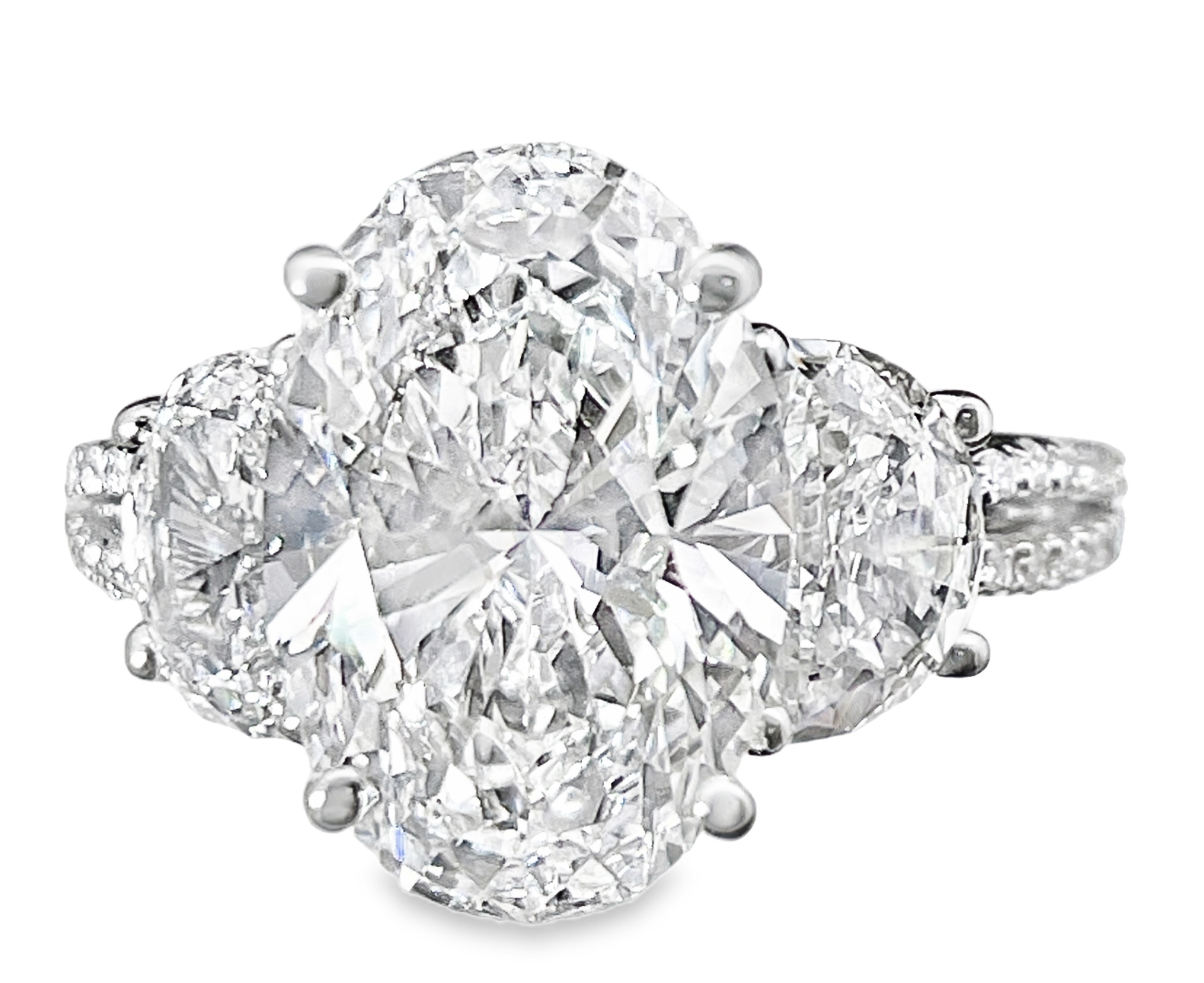 SUPER MAN MADE CREATED 10.24CTW DIAMOND "3-STONE" ENGAGEMENT RING CONTAINING: 5.01CT OVAL DIAMOND CENTER F VS2 IGI LG604321724 + 2 HALF-MOON DIAMONDS + 36 ROUND MELEE DIAMONDS 5.23CTW 14KW