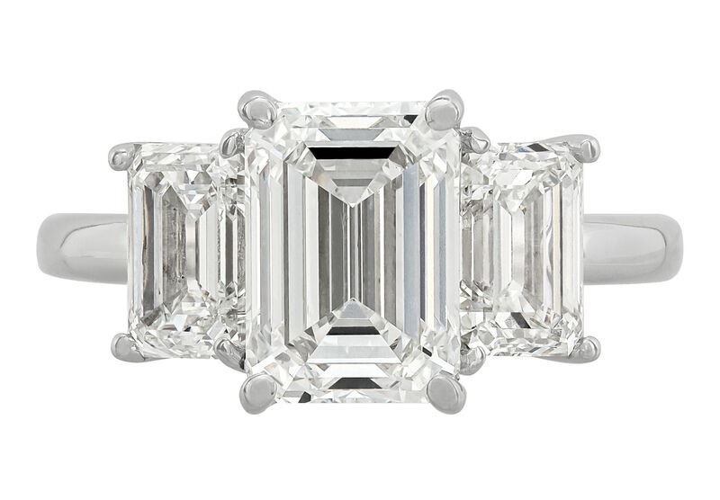 SUPER MAN MADE CREATED 5.12CTW DIAMOND 3-STONE ENGAGEMENT RING CONTAINING: 3.00CT EMERALD CUT DIAMOND CENTER F VS1 IGI LG638462761 + 1.06CT EMERALD CUT DIAMOND E VVS2 IGI LG620458264 + 1.06CT EMERALD CUT DIAMOND E VVS2 IGI LG572325865 14KW