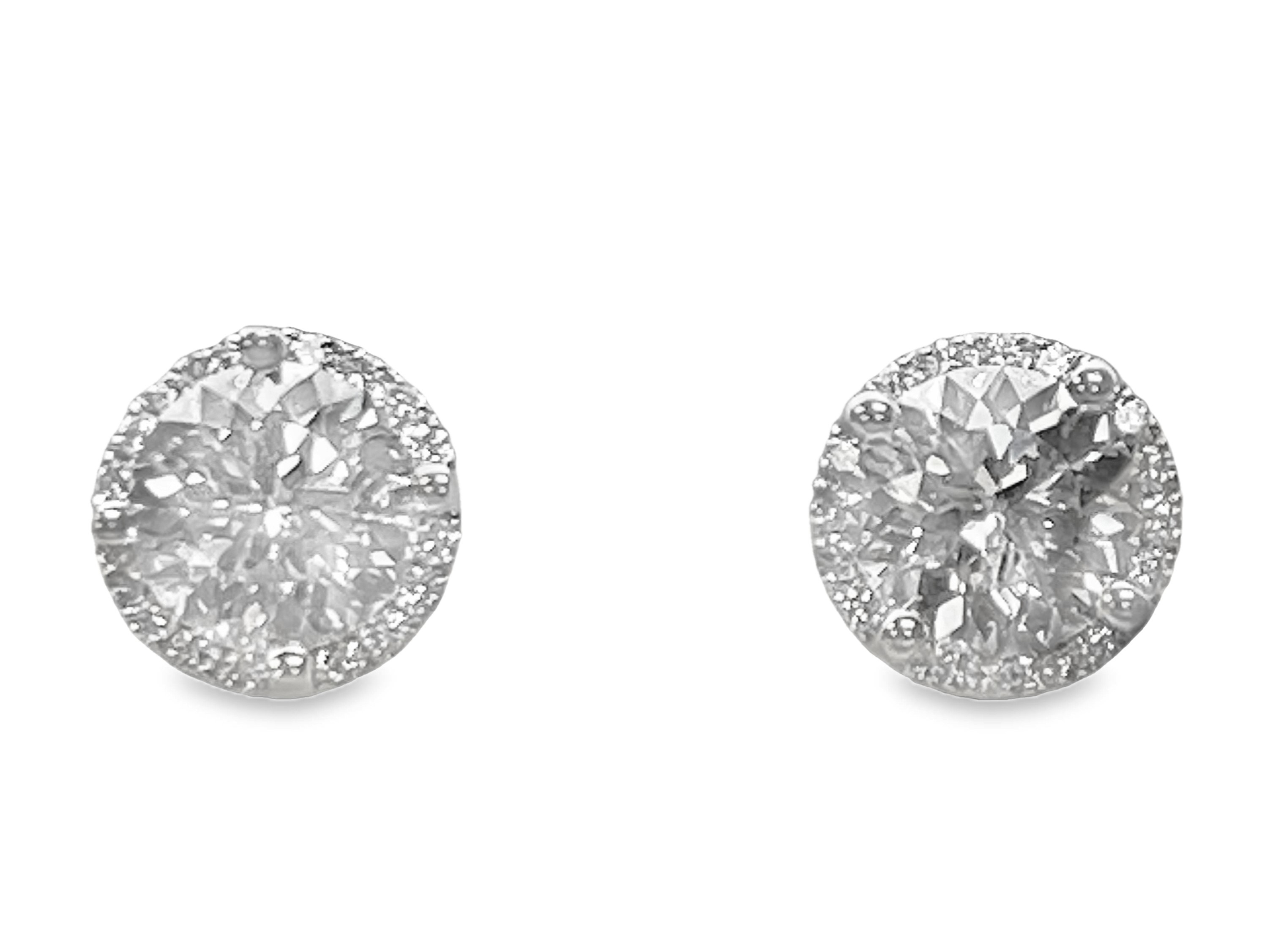 SUPER MAN MADE CREATED 2.58CTW ROUND HALO DIAMOND STUD EARRINGS CONTAINING: 1.21CT ROUND DIAMOND D VVS2 IGI LG645440167 + 1.21CT ROUND DIAMOND D VVS2 IGI LG645440174 + 32 ROUND HALO DIAMONDS .16CTW F VS2 14KW