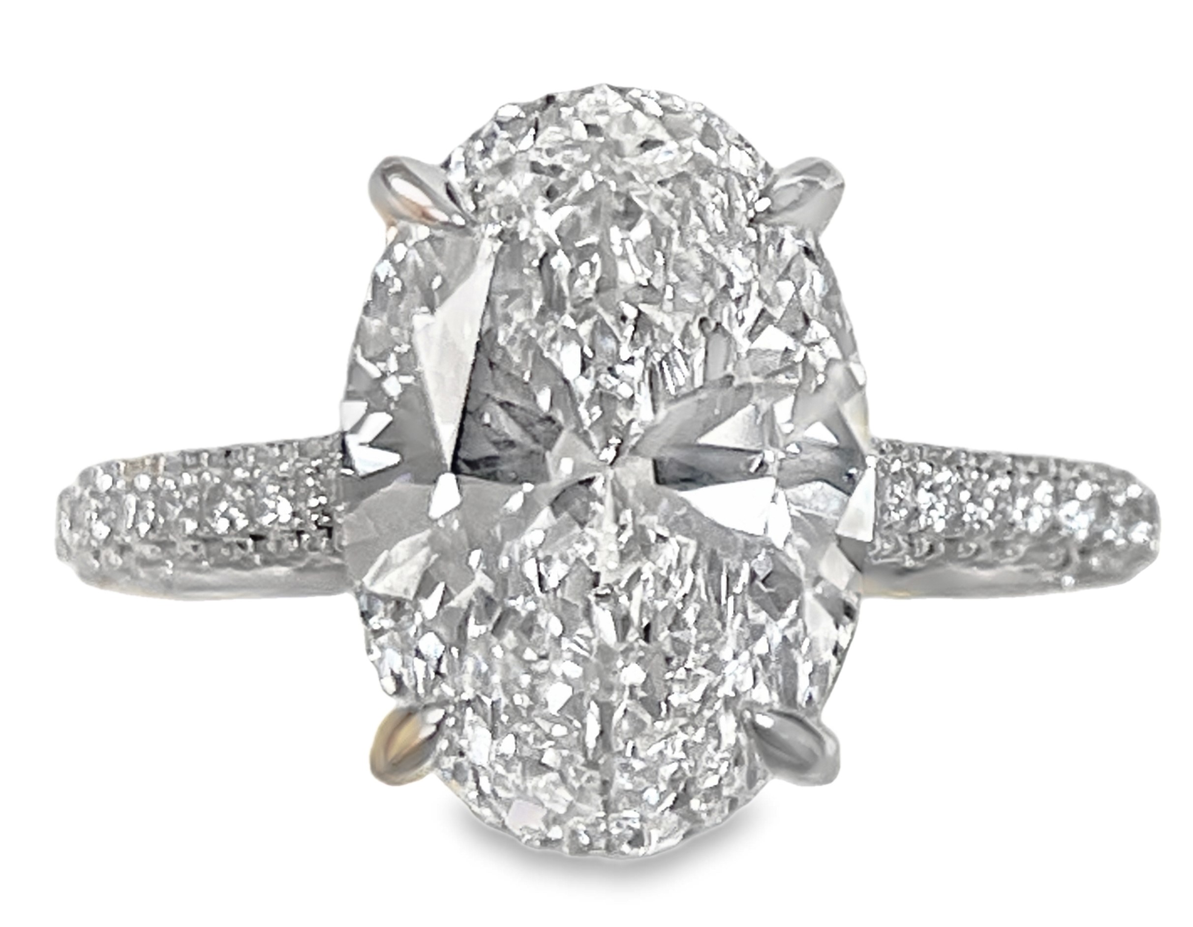 SUPER MAN MADE CREATED 4.79CTW ENGAGEMENT RING CONTAINING: 4.00CT 100-FACET OVAL DIAMOND CENTER E VVS2 FDX 73933840105 + 128 ROUND DIAMONDS .79CTW 14KW