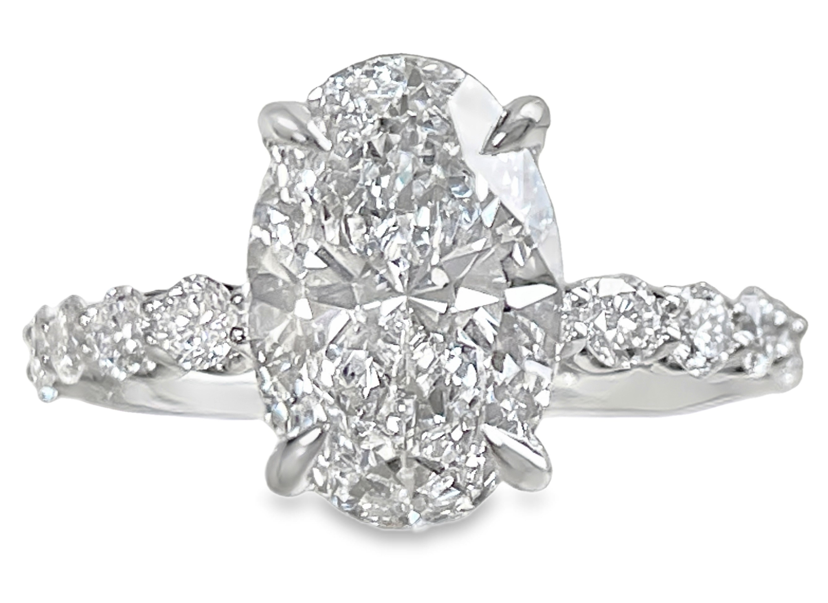 SUPER MAN MADE CREATED 3.92CTW ENGAGEMENT RING CONTAINING: 3.10CT 100-FACET OVAL DIAMOND CENTER E VS1 FDX 74260240108. + 6 ROUND MELEE DIAMONDS .82CTW 14KW