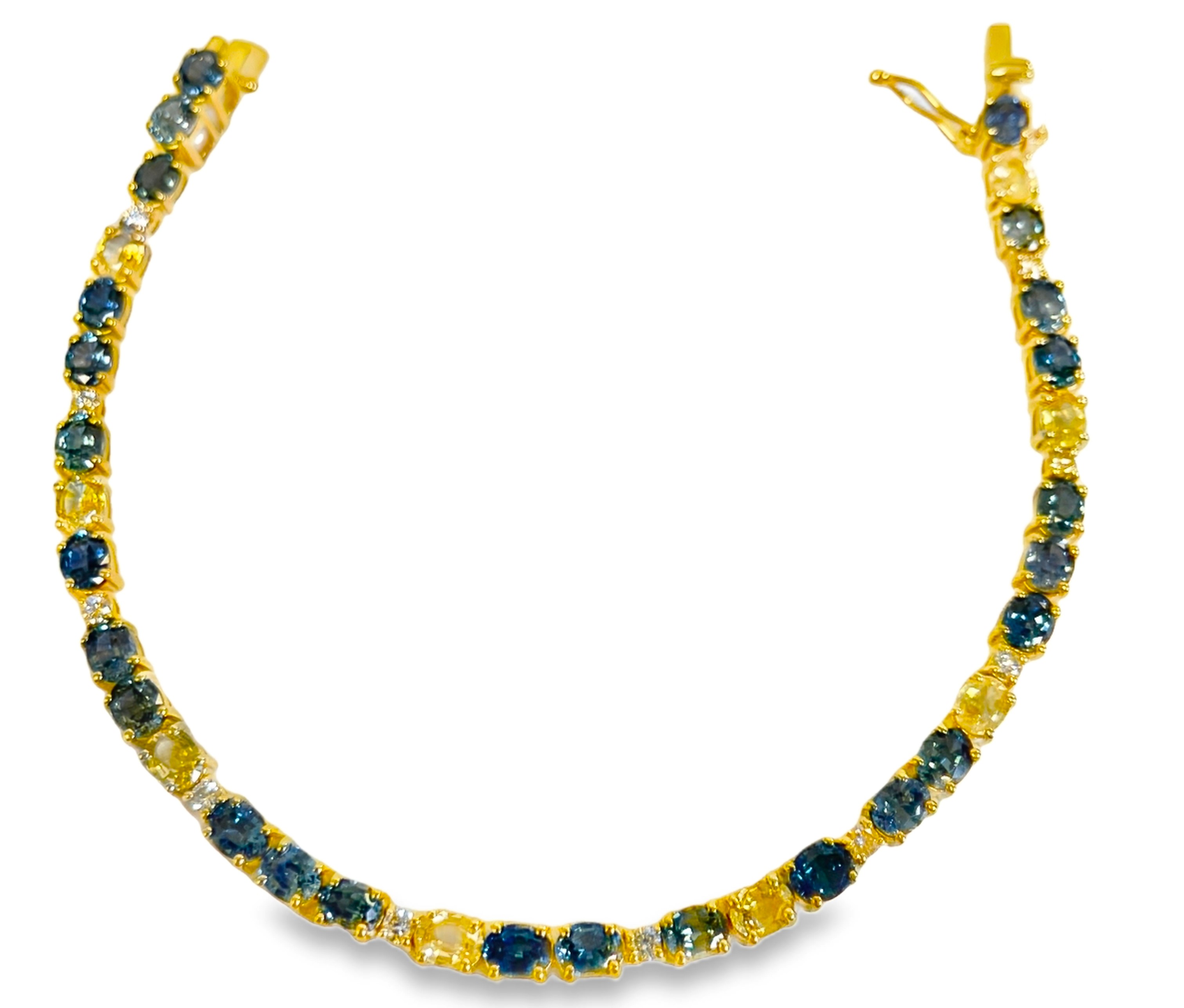 LE VIAN 8.65TGW MONTANA SAPPHIRE + DIAMOND STRAIGHT LINE BRACELET CONTAINING: 33 OVAL MONTANA SAPPHIRES 8.25CTW + 10 ROUND DIAMONDS .40TDW 14KY