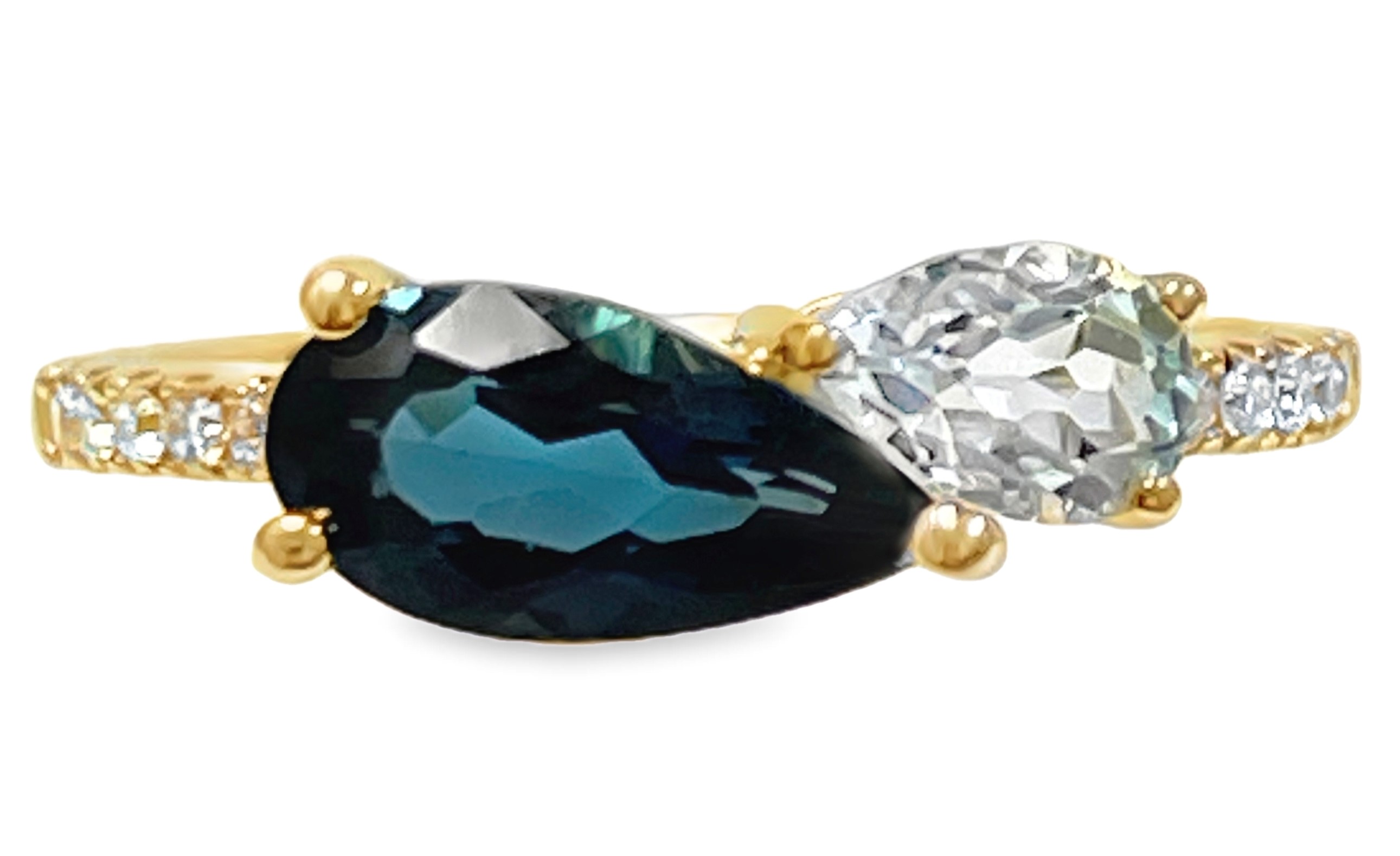 LE VIAN BLUE TOPAZ RING: 1 PEAR SHAPE BLUE TOPAZ + 1 PEAR SHAPE LONDON BLUE TOPAZ 1.48CTW + 10 ROUND DIAMONDS .11TDW 14KY