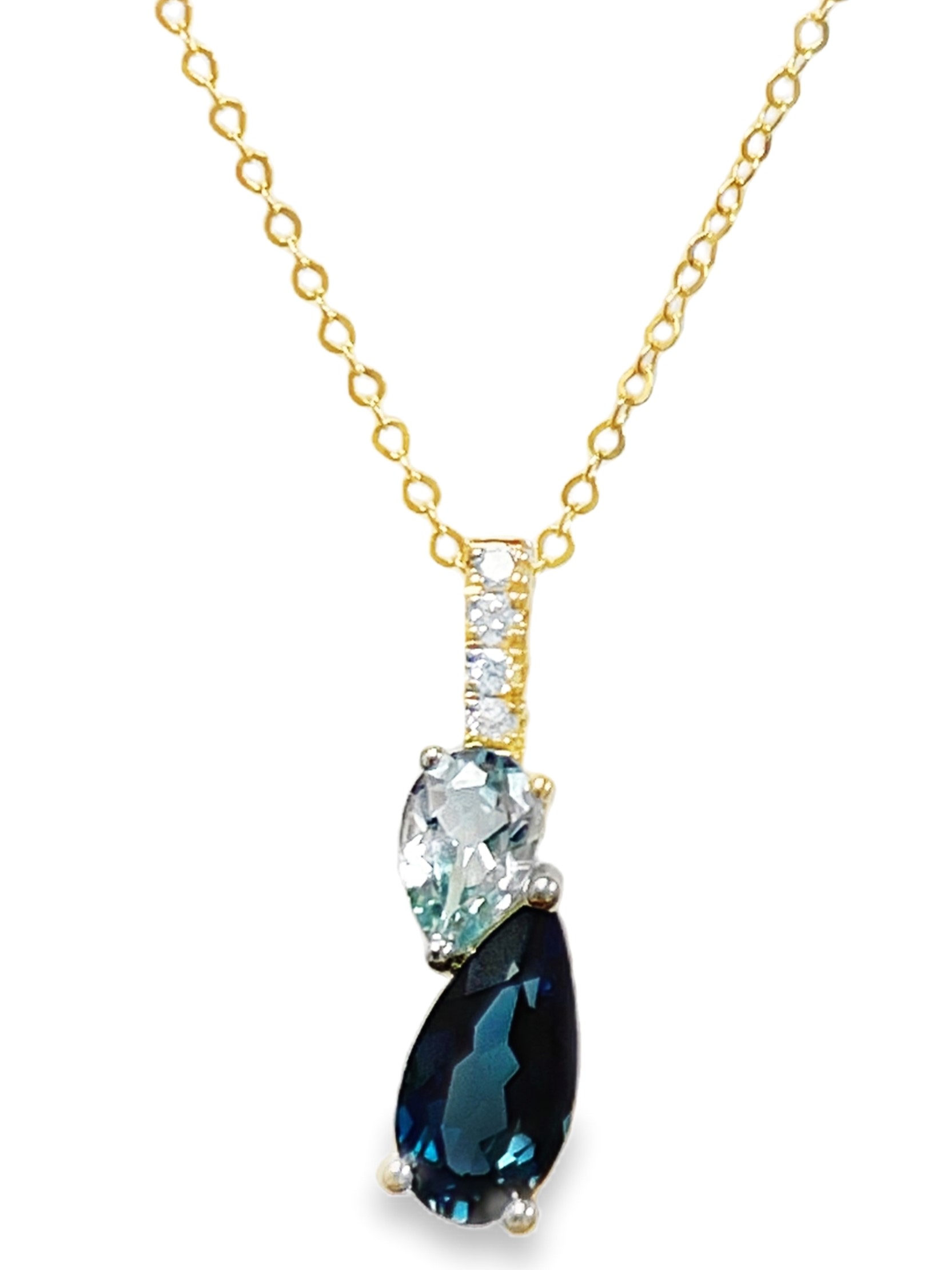 LE VIAN BLUE TOPAZ PENDANT/CHAIN: 1 PEAR SHAPE BLUE TOPAZ + 1 PEAR SHAPE LONDON BLUE TOPAZ 1.48CTW + 4 ROUND DIAMONDS .04TDW 14KY CHAIN INCLUDED